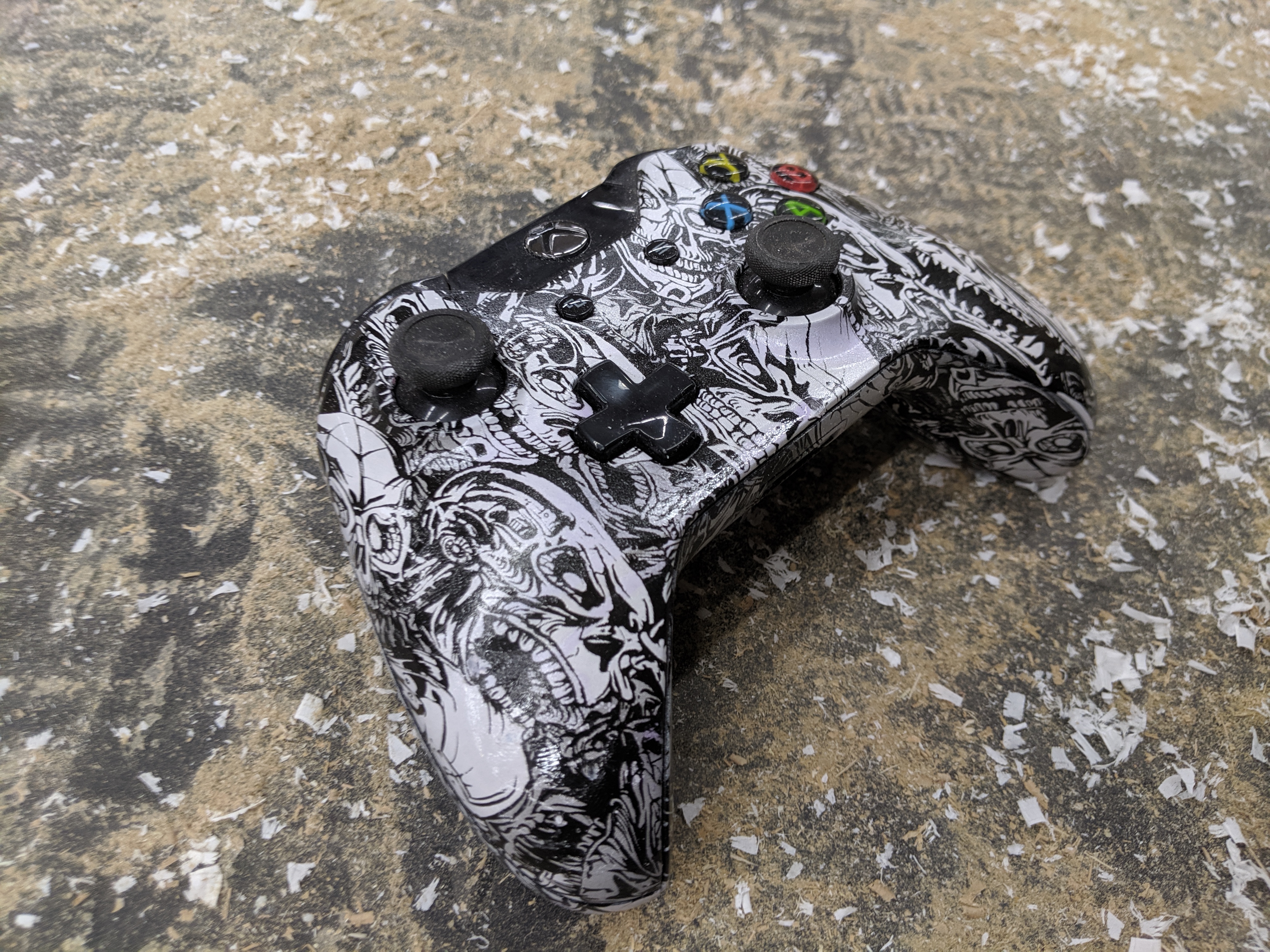 Custom black and white patterned game controller finish